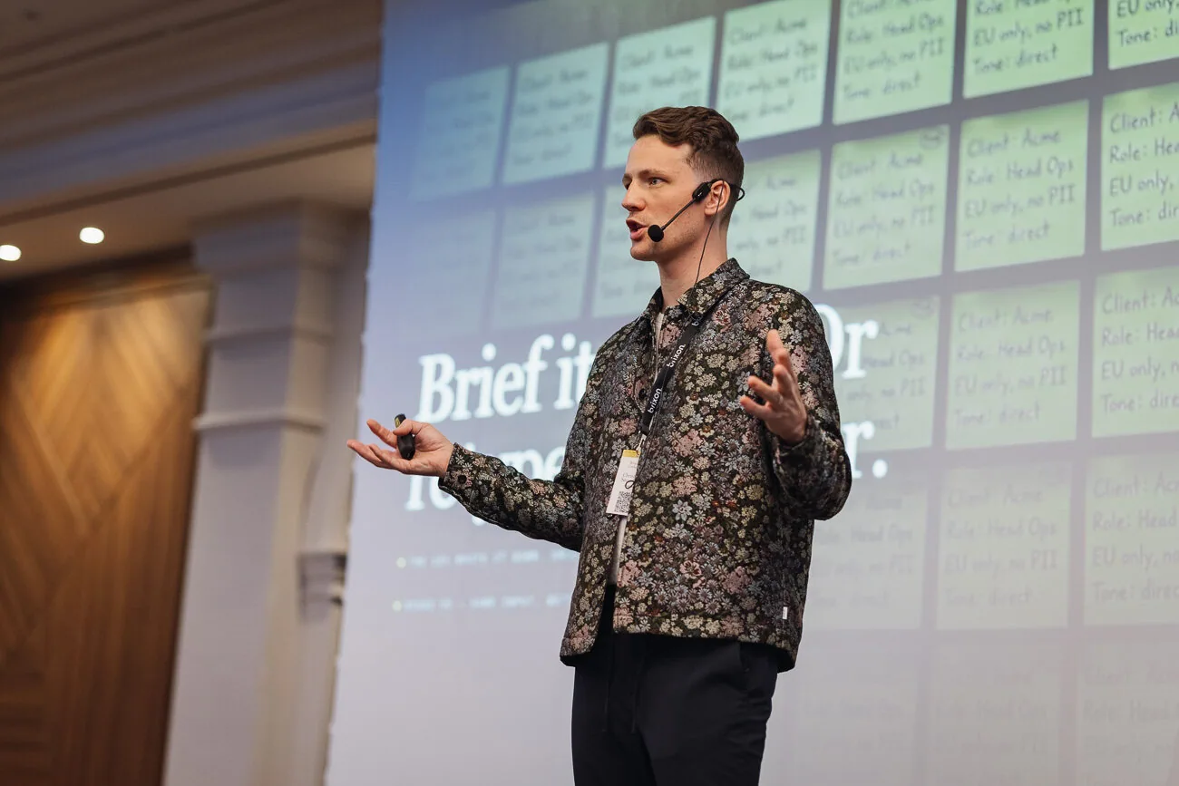 Christoph Sauerborn teaching how to brief an AI employee at the Brixon AI event